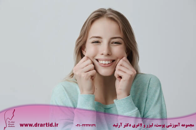 charming broadly smiling with perfect teeth young european woman with blonde long hair wearing light blue sweater pinching cheeks mocking having good mood fun face expressions emotions 176420 15108 - چگونه گونه‌ها و صورت پری داشته باشیم؟